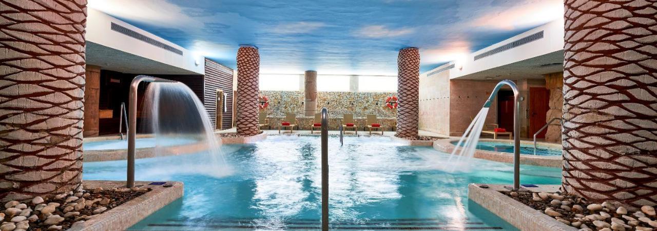 Hotel & Spa S'Entrador Playa Кала Ратхада Екстериор снимка